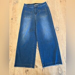 FRYE 28 waist wide leg /slight cropped jeans Raw hem, plenty of stretch